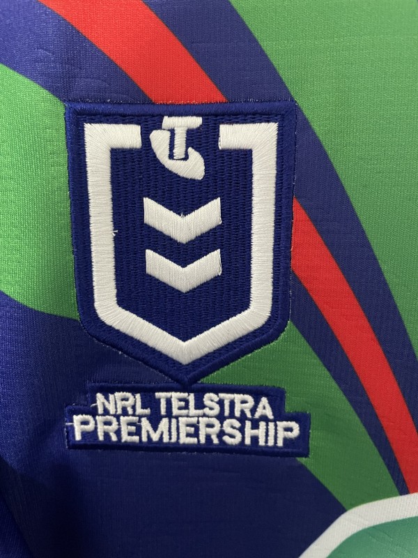 25/26 New Zealand Warriors Navy Blue with Green and Red Diagonal Stripes and Circular Gradient Heritage Jersey